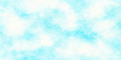 Bright blue sky with abstract watercolor clouds and sunlight