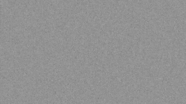 Gray static noise texture background with fine grain pattern for digital effects