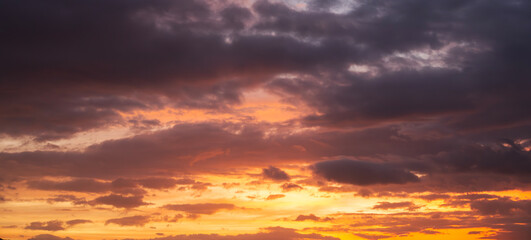 Sunset sky background, with colorful clouds. Evening colors.