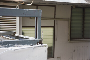 Metal framework and debris on a partially demolished building