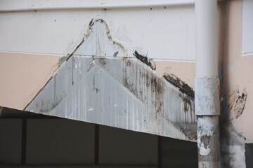 Pile of broken red bricks, tiles, and gray concrete debris