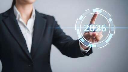 Businesswoman touching digital screen with 2026 year target