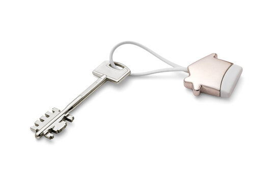 House key with house shaped keyring on white background