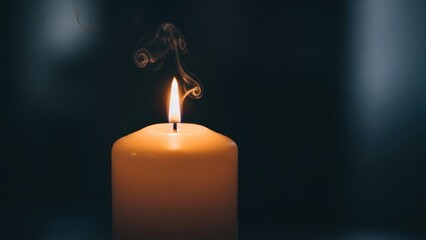 Candle Flame in Darkness - A Symbol of Hope and Remembrance.