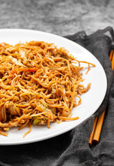 Chicken, pepper, and vegetables noodles on plate