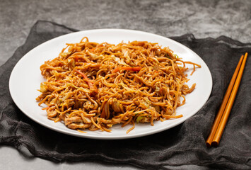 Chicken, pepper, and vegetables noodles on plate
