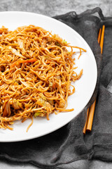 Chicken, pepper, and vegetables noodles on plate