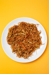 Chicken, pepper, and vegetables noodles on plate