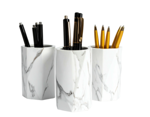 Three decorative white marble-like pen holders filled with black, gold, and bronze writing tools
