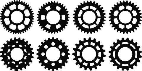 Set of eight different black industrial mechanical engineering gear wheel and cog silhouettes for technology and machinery isolated on white