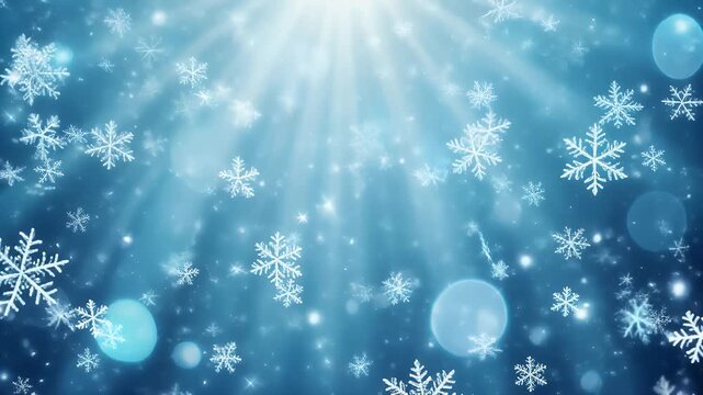 Delicate snowflakes gently falling against a soft blue background create a magical winter atmosphere.