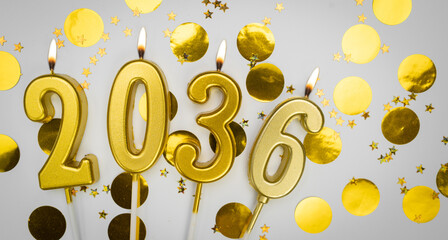 New Year greeting card. background Happy New Year 2036. Golden candles with numbers of year 2036 on...