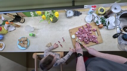Cooking together in the kitchen with family
