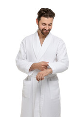 Handsome man wearing bathrobe on white background