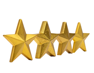 Close-up of four golden, metallic stars arranged in a row against a black background
