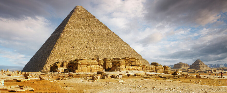 Pyramid of Khufu (Keops) in Giza under a cloudy sky, Egypt