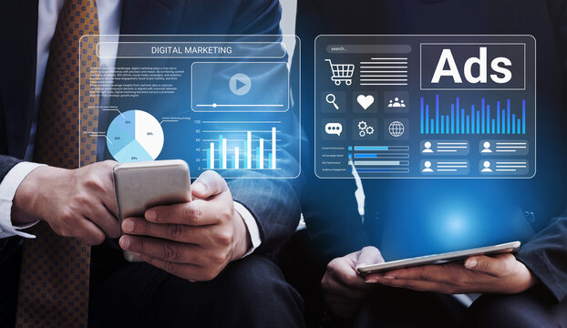 Two business professionals collaborate on digital marketing strategies, utilizing advanced technology and data analytics to enhance their advertising efforts and business growth. Gantry - Powered by Adobe