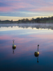 Two White Buoys Still Lake