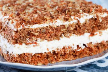 A layer carrot cake with coconut cream.