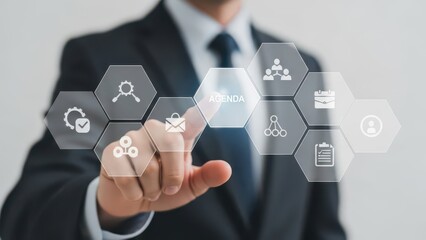 Businessman touching agenda icon on virtual interface display screen