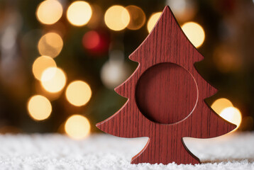 Red wooden Christmas tree decoration with blank space for text  