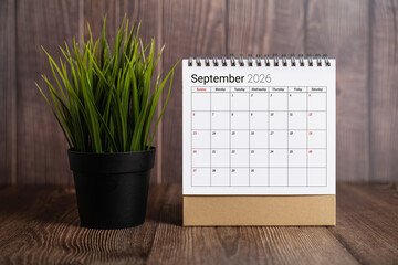 September 2026 Desk Calendar On Wood Table