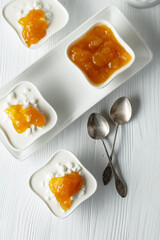 Cottage cheese with cream and mango jam.