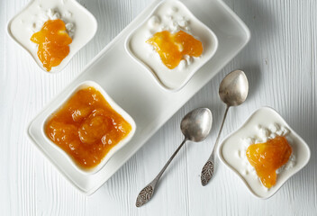 Cottage cheese with cream and mango jam.