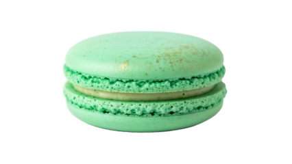 Green macaron with golden accents, festive tone for St. Patrick’s Day, isolated on white background with copy space for concept