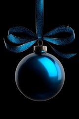 Blue Christmas ball with festive ribbon.
