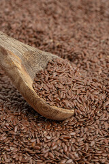 Wooden spoon with flax seeds