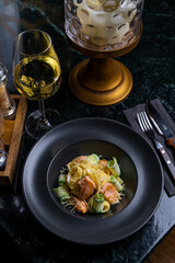 Gourmet Salmon Pasta Dish with Wine - Fine Dining Experience