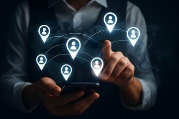 Business professional using smartphone to connect with global network of people through digital location icons for online communication