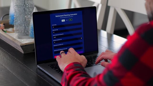 Middle Aged Man Using Retirement Calculator App at Kitchen Table Finding Savings Underestimated Funds Required to Financially Survive Concept