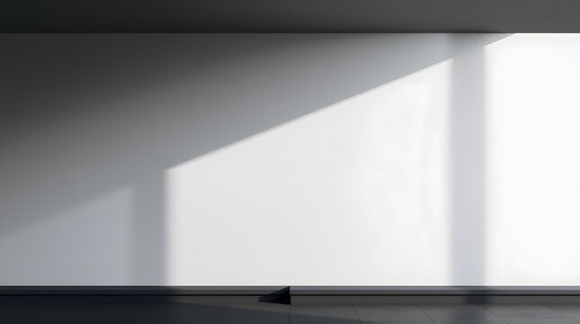Interior wall with light and shadow creating an abstract design in a minimalist setting look