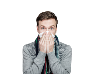 young man blowing his nose with tissue