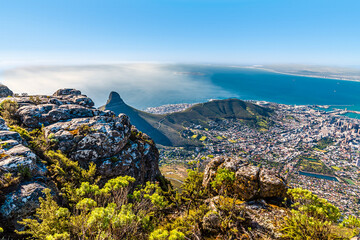 A view from the summit of Table mountain towards Lions Head mountain, South Africa in springtime