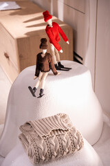 Wooden Mannequins Wearing Winter Sweaters on Display