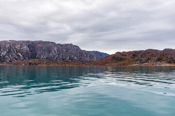 Turquoise Blue Placid Waters of the Labrador Sea fed by Glacial Silt near the Remote Village of Ivittuut, Greenland