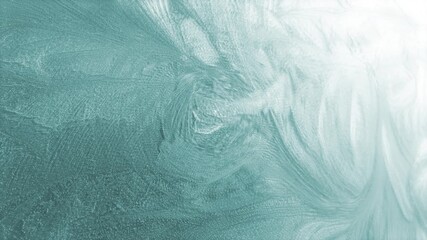 Rotating ice themed winter background of defocused soft swirling icy frost particle patterns naturally forming cold chilly frost pretty floral organic shapes in cold chilly cool icy white 4K animated - Powered by Adobe