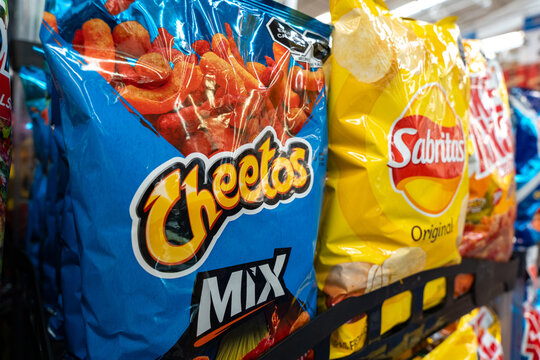 Cheetos and Sabritas bags on a supermarket shelf. Frito-Lay PepsiCo brands, originated in Mexico United States. Guadalajara, Jalisco, December 4, 2025.