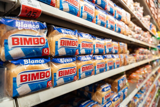 Bimbo White Bread loaves on a Walmart shelf. Grupo Bimbo brand, originated in Mexico City, Mexico (since 1945). Jalisco, Mexico, December 4, 2025.
