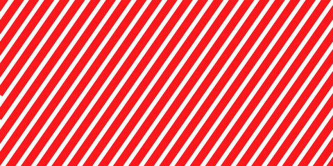 Striped candy cane seamless pattern for Christmas or New Year decoration, red and white diagonal stripes background, Xmas gift wrap, winter holiday present wrapping paper