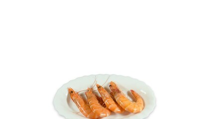 Cooked shrimp with shells on white plate