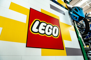 Fototapeta premium Lego logo poster in the supermarket toy section. The Lego Group brand, originated in Denmark. Guadalajara, Jalisco, Mexico, December 4, 2025.