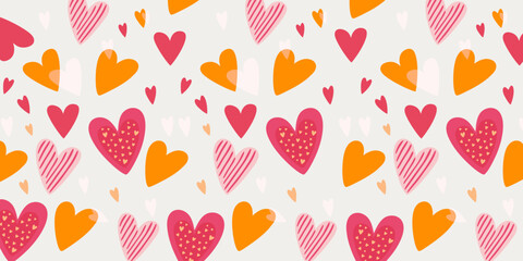 Lively seamless pattern of hand drawn hearts in pink, orange, and red tones, perfect for Valentines Day, romantic designs, stationery, and playful decorative themes.