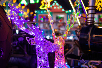 Christmas deer kissing light display