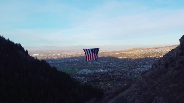 4K Aerial Views of The Major Large American Flag Hanging in Mountains of North Ogden Utah Veterans Day - Coldwater Creek Canyon 