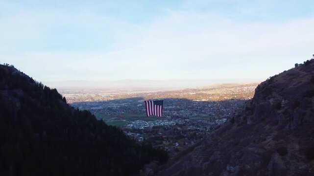 4K Aerial Views of The Major Large American Flag Hanging in Mountains of North Ogden Utah Veterans Day - Coldwater Creek Canyon 