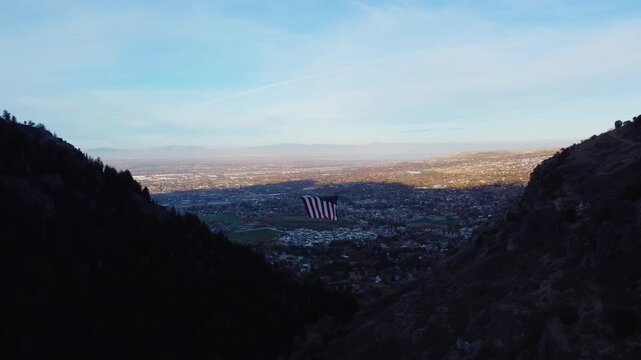 4K Aerial Views of The Major Large American Flag Hanging in Mountains of North Ogden Utah Veterans Day - Coldwater Creek Canyon 